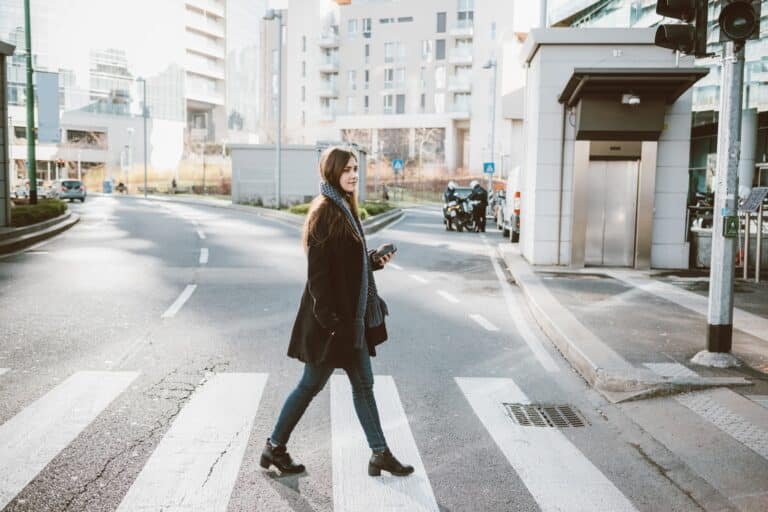 Young woman using smartphone outdoor