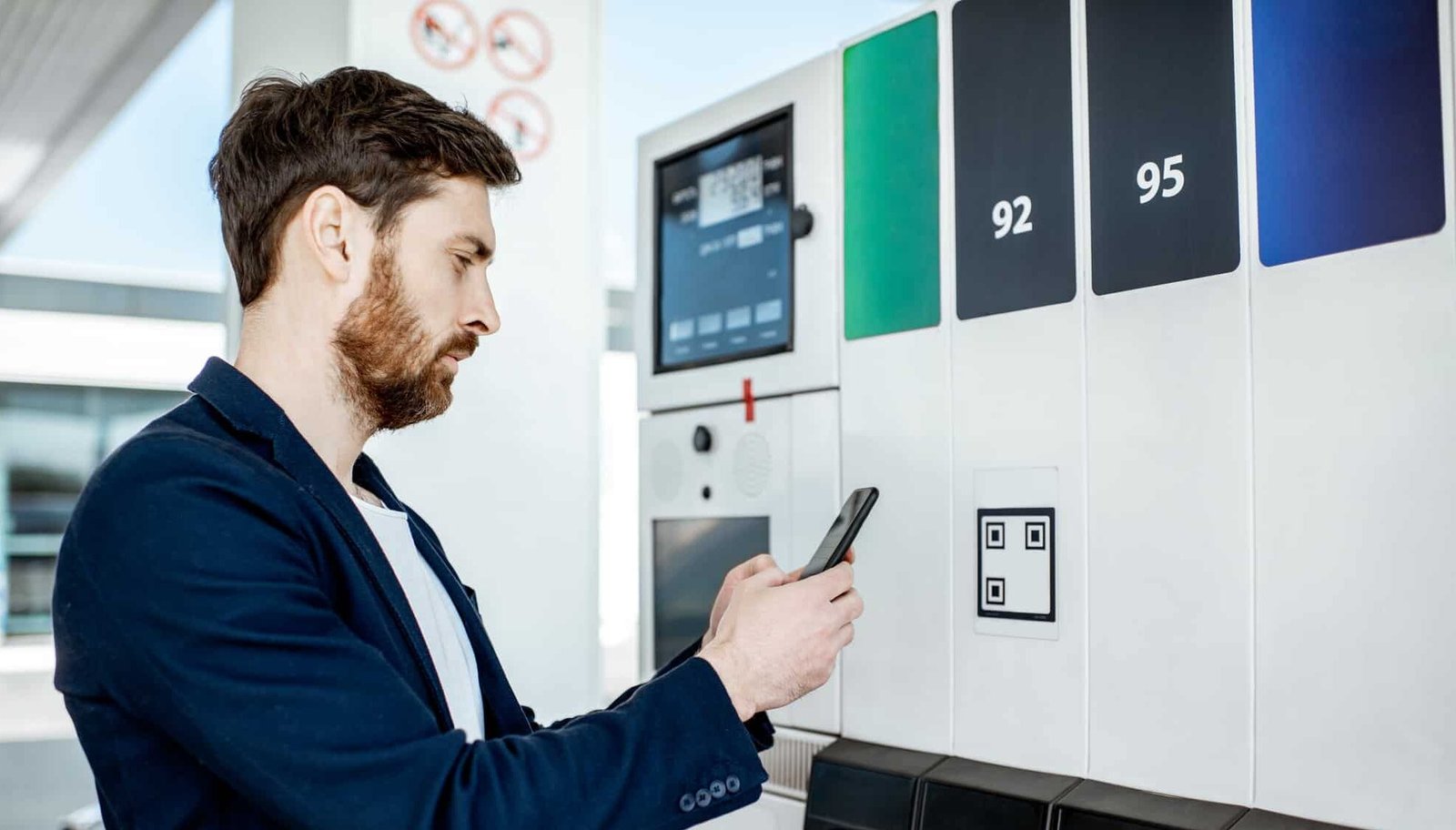 Business person scanning QR code at power bank station